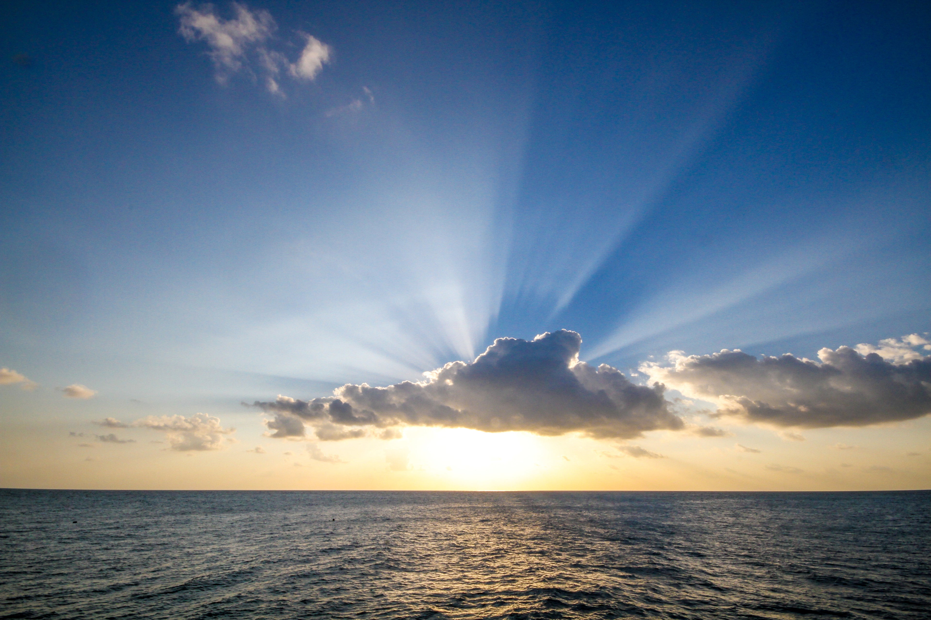 sun-setting-over-ocean representing calmness of a human if he wins with himself.